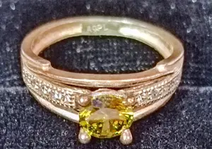 This attractive 21K hallmark emerald ring, lifetime guarantee