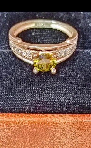 This attractive 21K hallmark emerald ring, lifetime guarantee