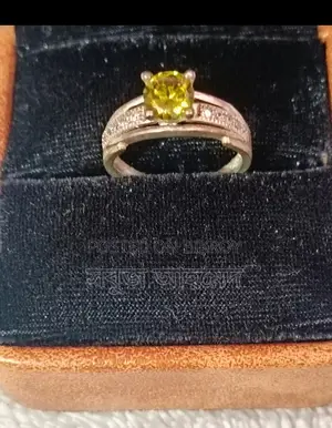 This attractive 21K hallmark emerald ring, lifetime guarantee