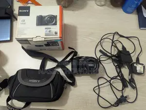 Sony A5100 Mirrorless Camera With Lens, Original Charger Box.