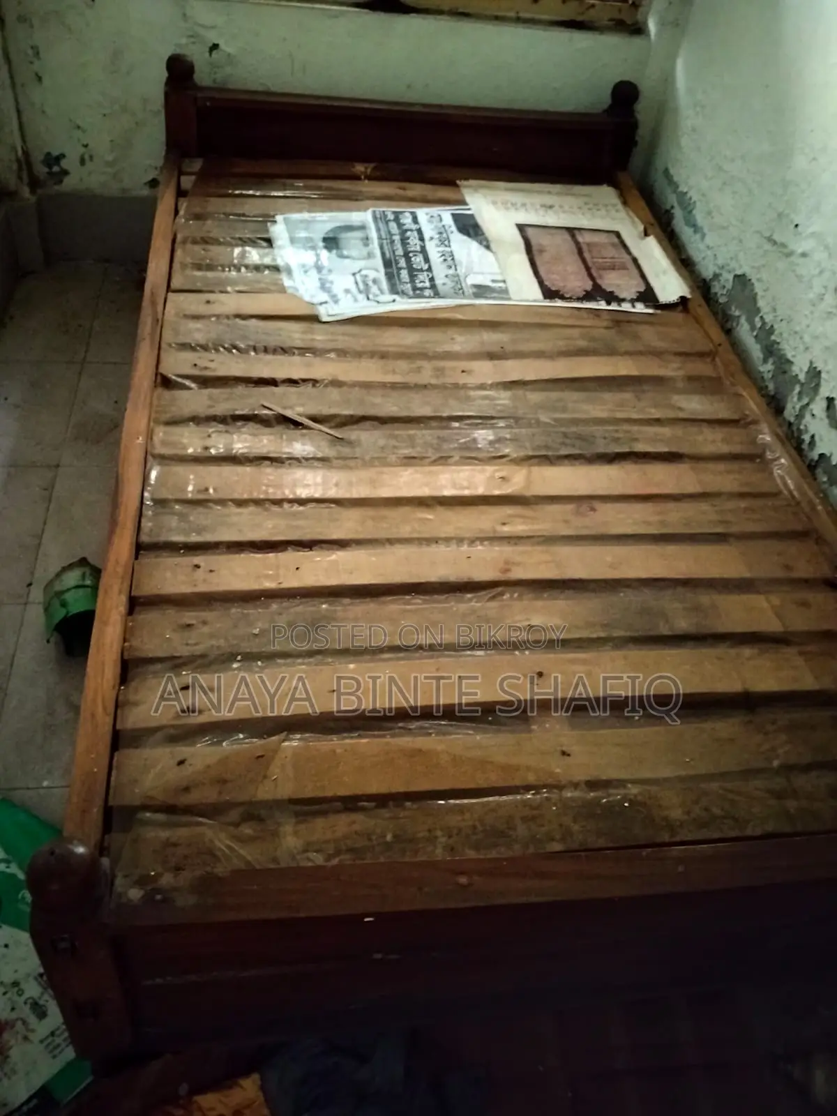Two high-quality, sturdy wooden beds for sale.