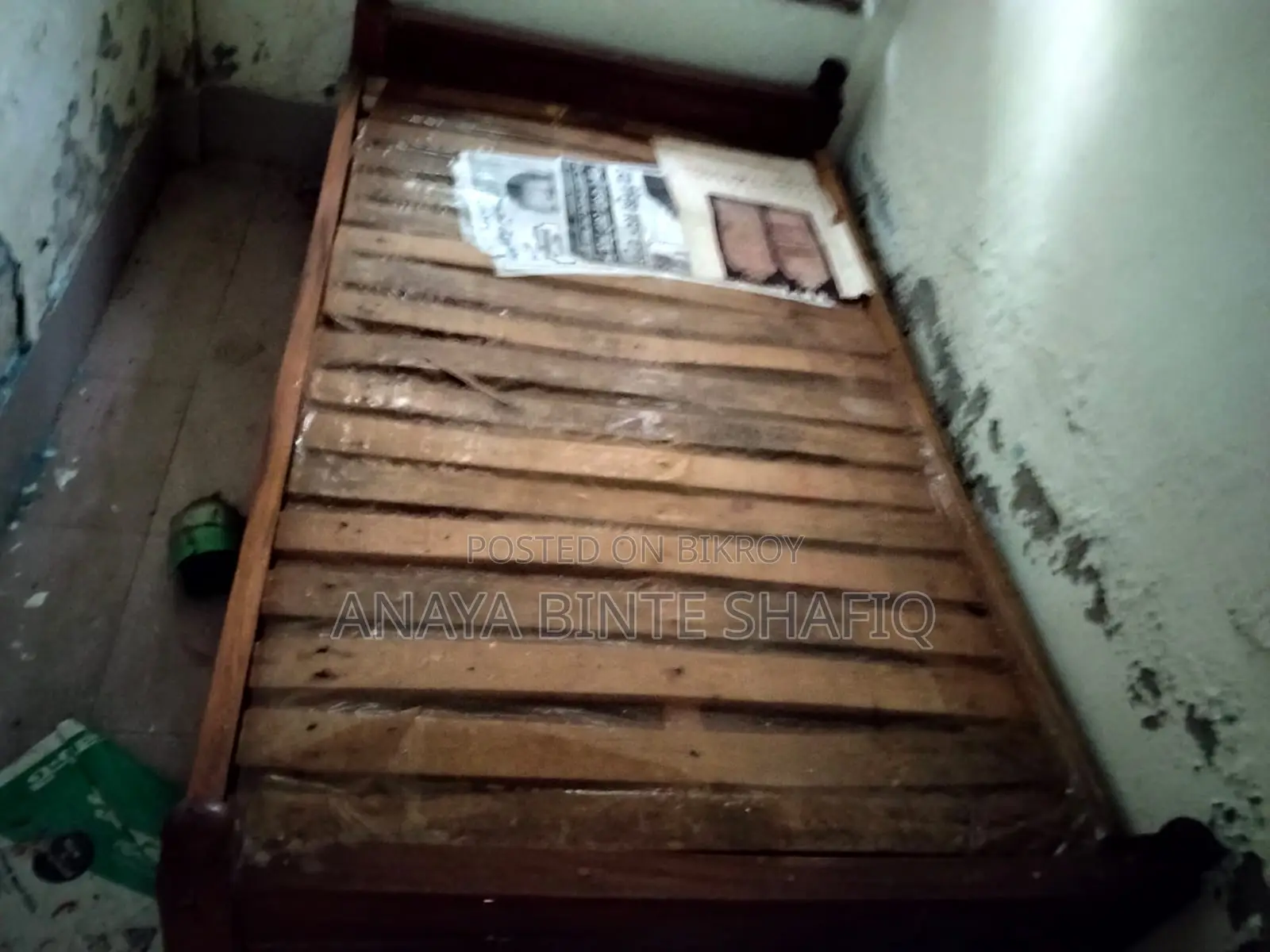 Two high-quality, sturdy wooden beds for sale.