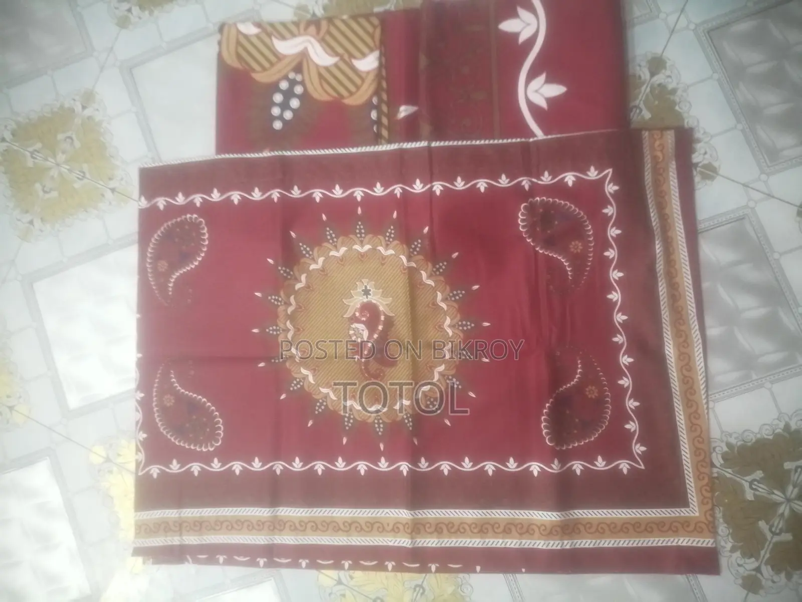 এক ফুলের বিছানার চাদর