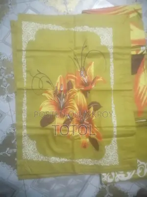 এক ফুলের বিছানার চাদর