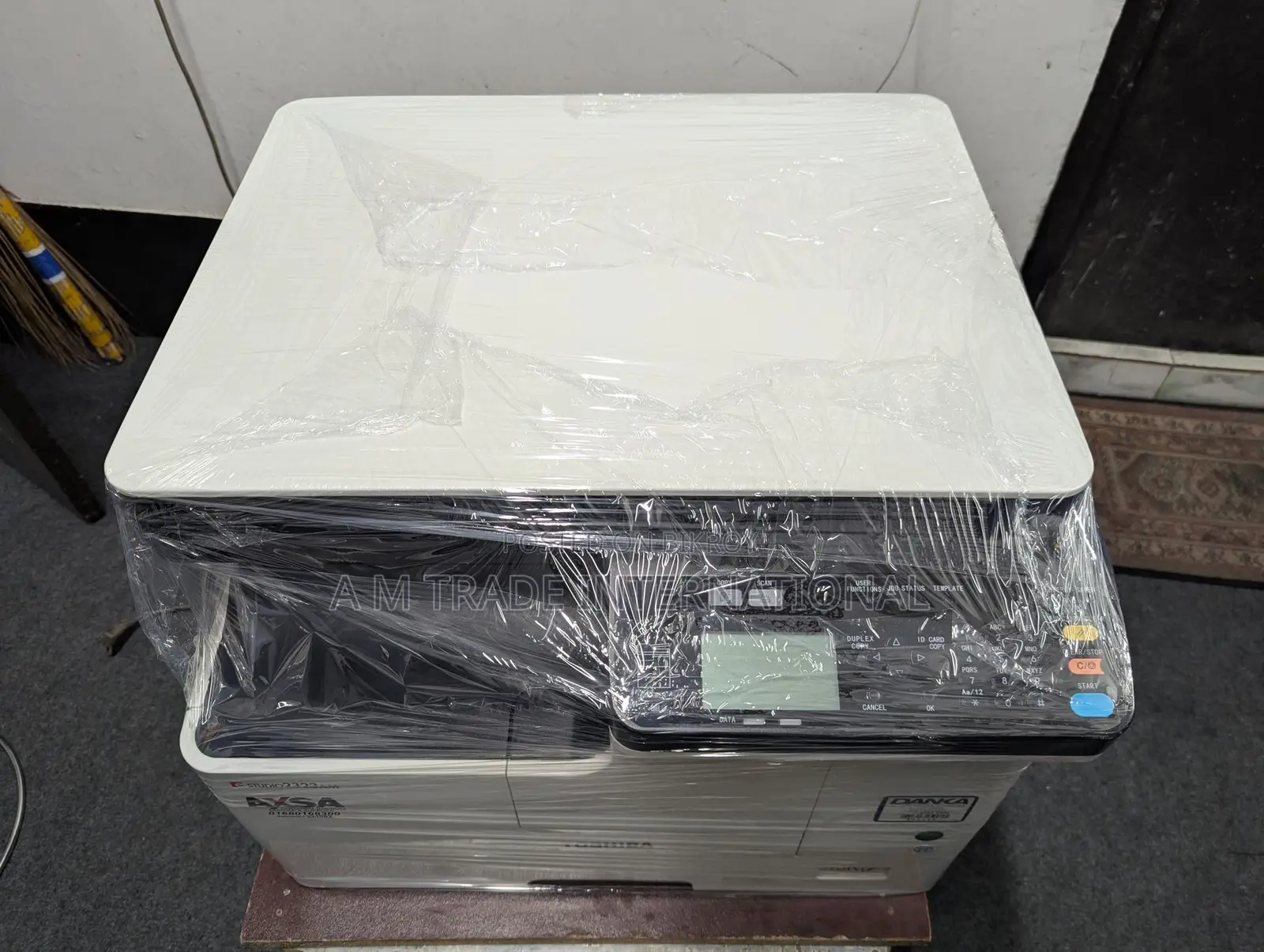 Toshiba 2323am: Fresh machine with duplex and network printing.