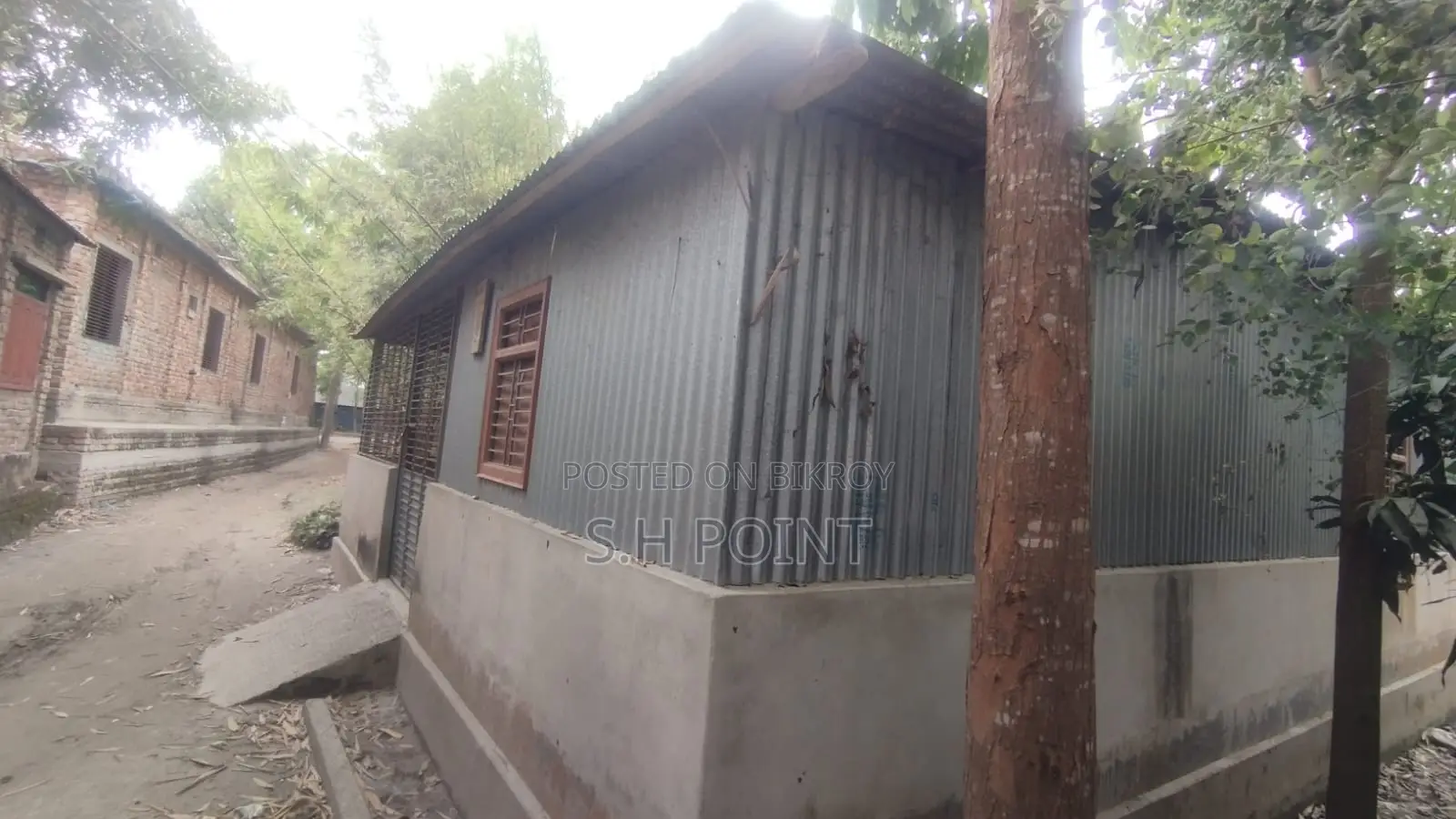 Land with House in Sirajganj City at 5.5 Lakh per Decimal
