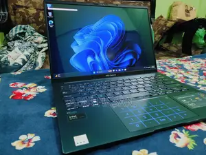 Model: ASUS ZenBook 14 OLED