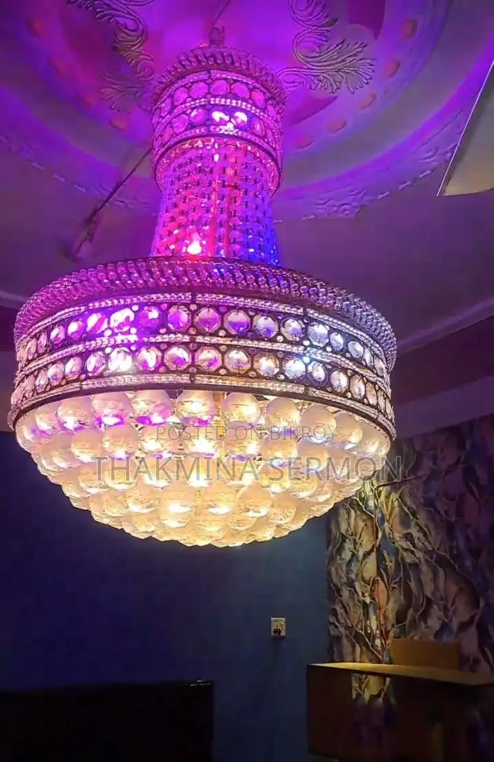 Two Large Chandeliers For Sale.