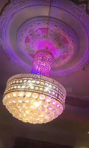 Two Large Chandeliers For Sale.