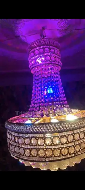 Two Large Chandeliers For Sale.