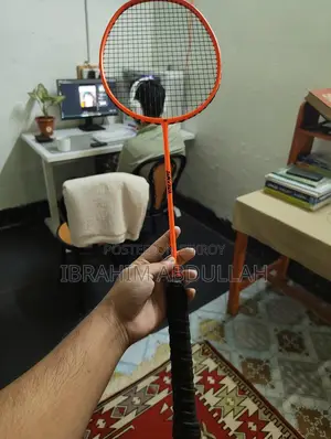 Urgent Sale: Like-New Badminton Racket (Excellent Condition)