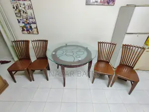 ৪ চেয়ারের ডাইনিং টেবিল, গ্লাস টপ , ব্রাদার্স ফার্নিচার থেকে কেনা।