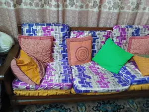 Five-piece sofa set. Made of Teak wood.