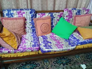 Five-piece sofa set. Made of Teak wood.