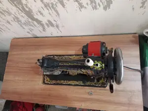 Original Singer sewing machine for sale with motor