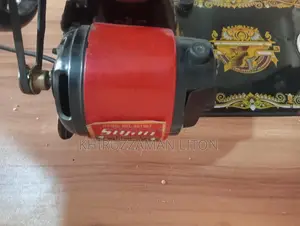 Original Singer sewing machine for sale with motor