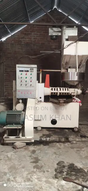 Automatic Mustard Oil Press Machine. Includes filter and looks like new.