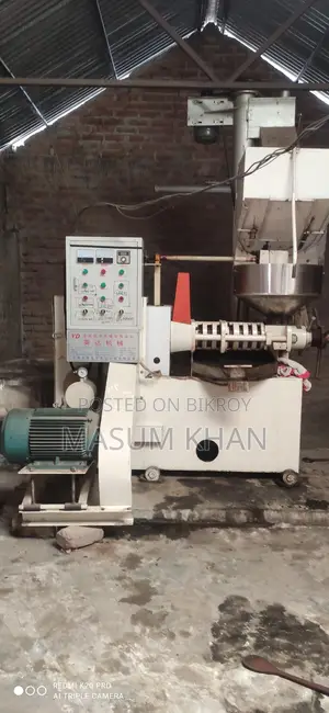 Automatic Mustard Oil Press Machine. Includes filter and looks like new.