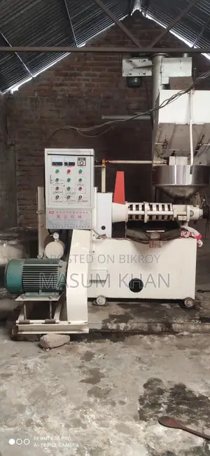 Automatic Mustard Oil Press Machine. Includes filter and looks like new.