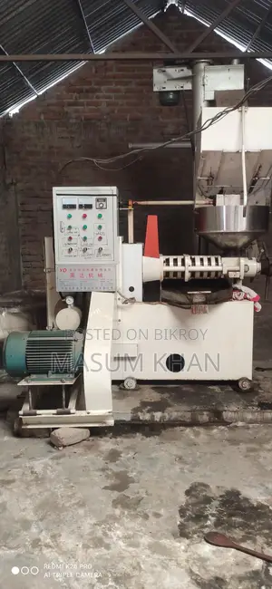 Automatic Mustard Oil Press Machine. Includes filter and looks like new.