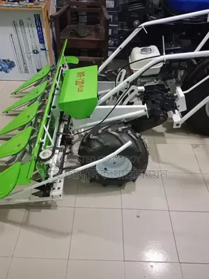 Paddy Harvesting Reaper Machine