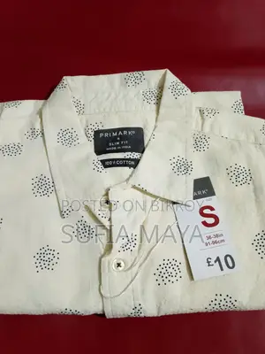 Ultra-Soft Fabric Shirt. Imported.