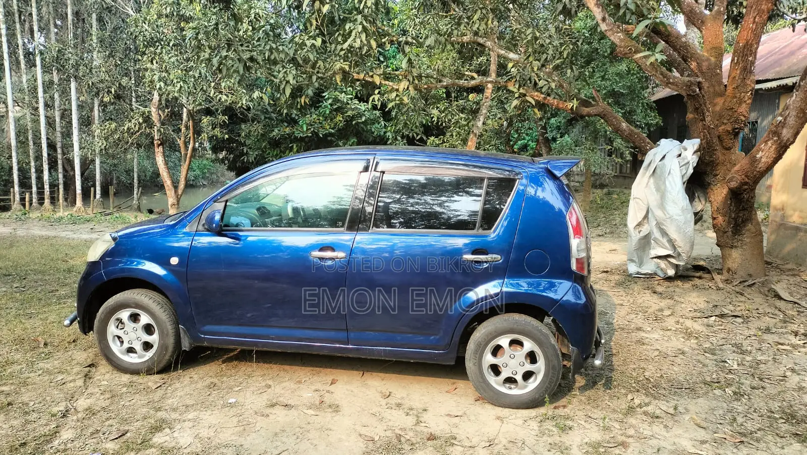 Toyota Passo . 2004