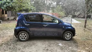 Toyota Passo . 2004