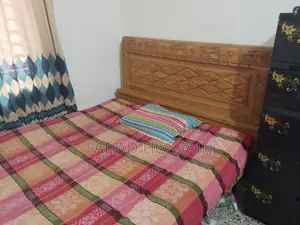 Segun Wood Bed