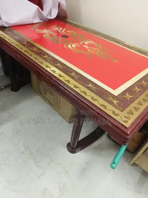 Plastic six-seater dining table.