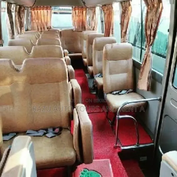 Nissan AC Coaster Bus For Rent