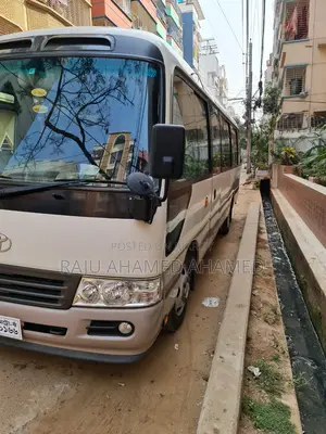 Nissan Coster Bus For Rent