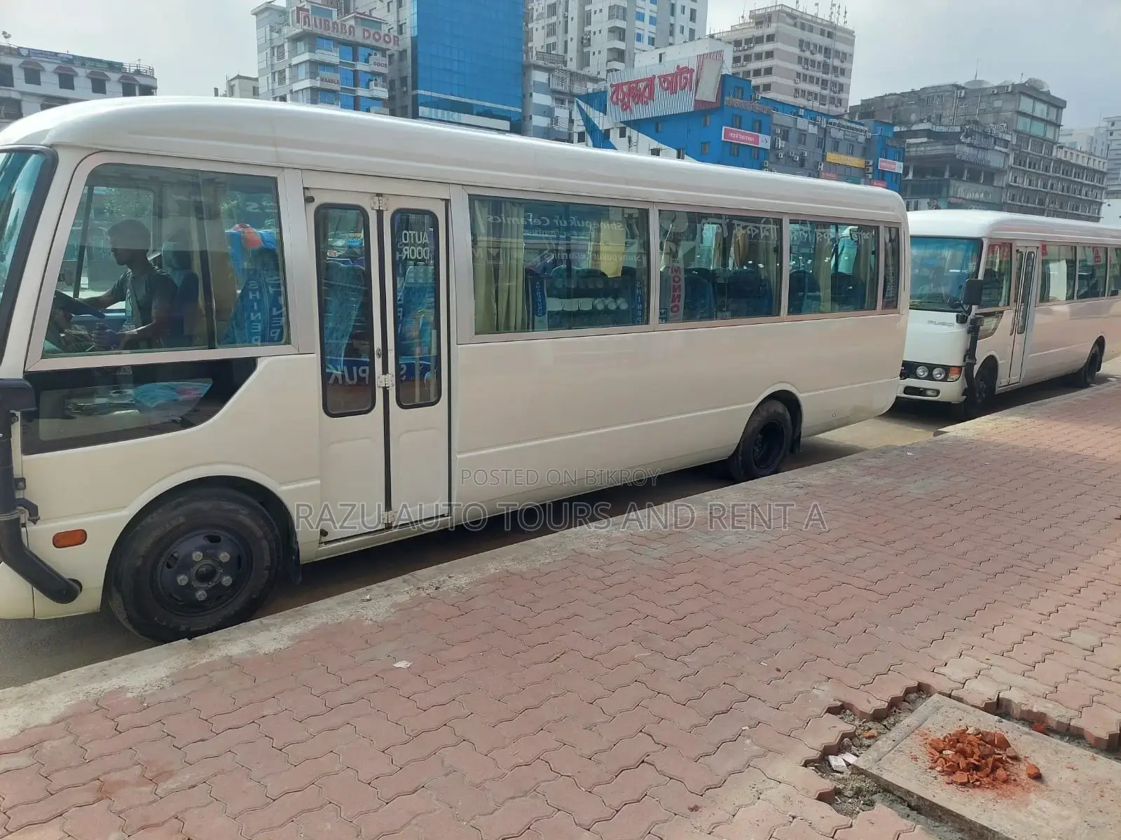 নিসান এসি কোস্টার বাস ভাড়ার জন্য