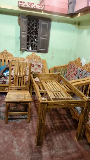 This Chittagong teak dining table will be sold, beside Postogola Bridge