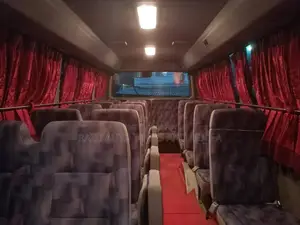 Rent a Nissan Coaster AC Bus