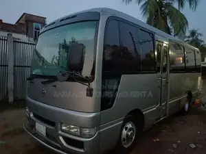 Rent a Nissan Coaster AC Bus