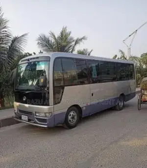 Rent a Nissan Coaster AC Bus