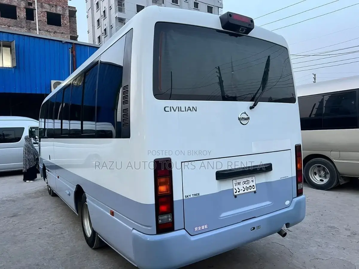 নিসান কোস্টার বাস ভাড়া