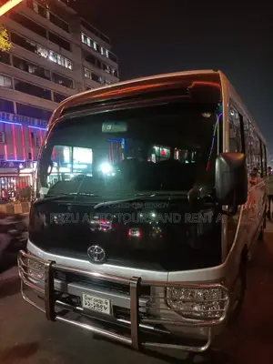 নিসান কোস্টার বাস ভাড়া