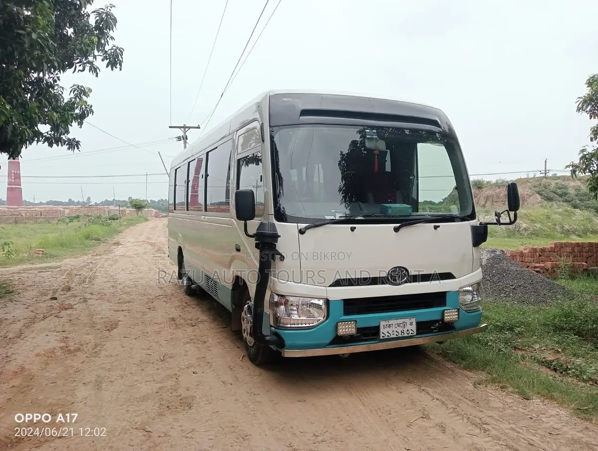 নিসান কোস্টার বাস ভাড়া