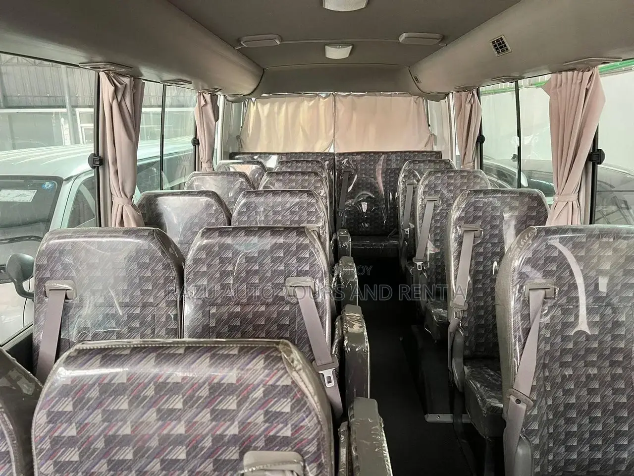 Nissan Coster Bus For Rent