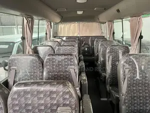 Nissan Coster Bus For Rent
