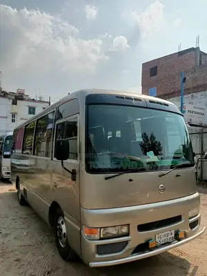 Nissan Coster Bus For Rent