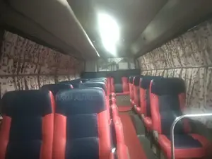 Nissan Coster Bus For Rent
