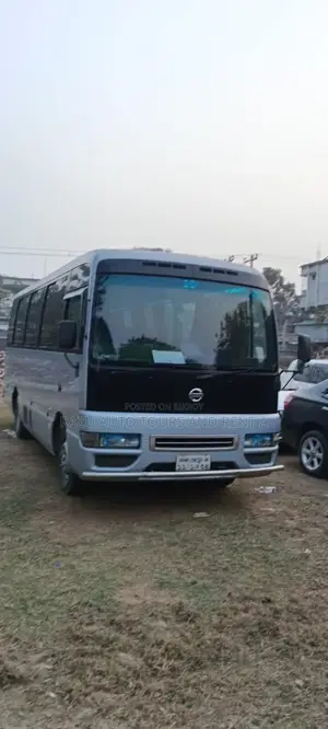 Nissan Coster Bus For Rent