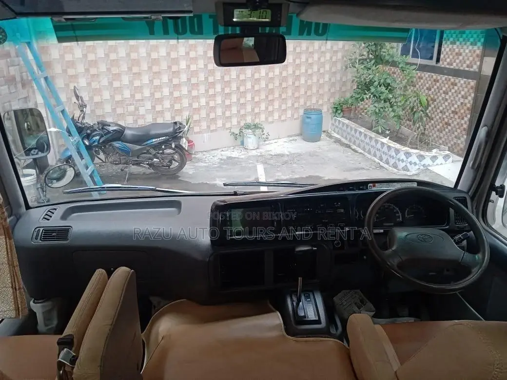 Nissan Coster Bus For Rent