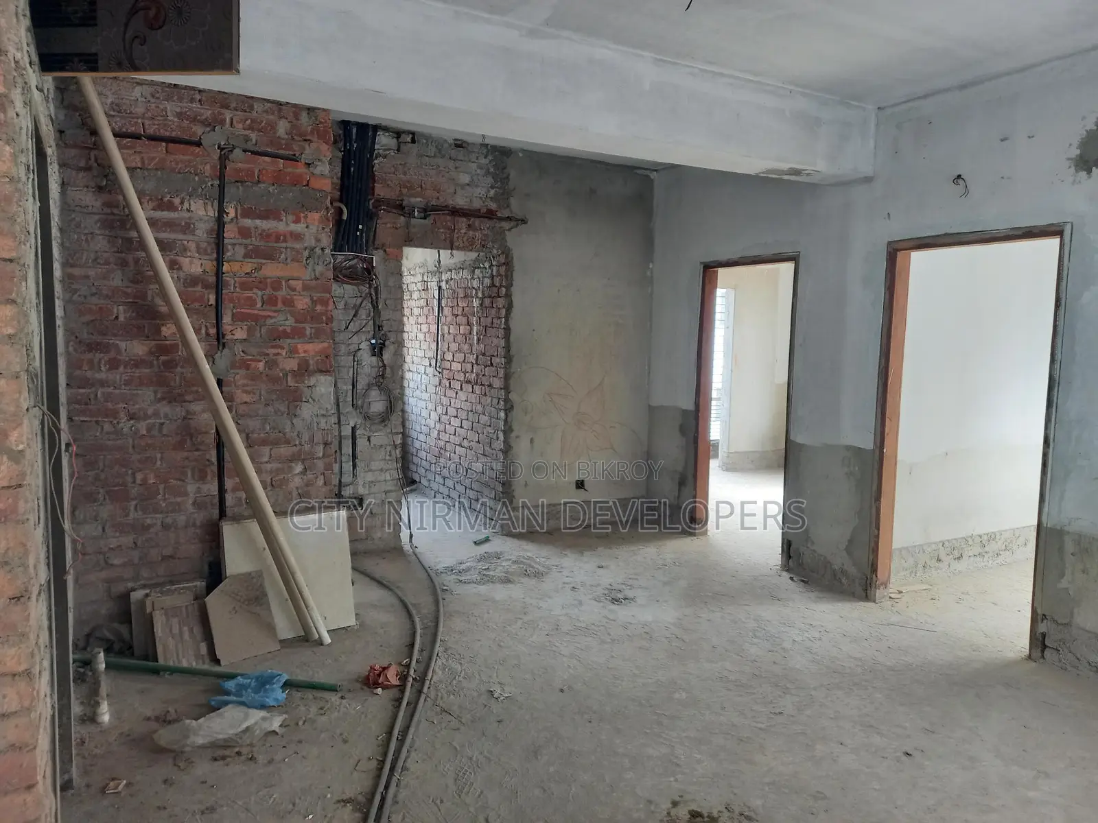 1000 sqft Ready Flat for Sale in the "Nirman Aparajita" Project!