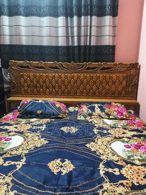 Teak wood bed