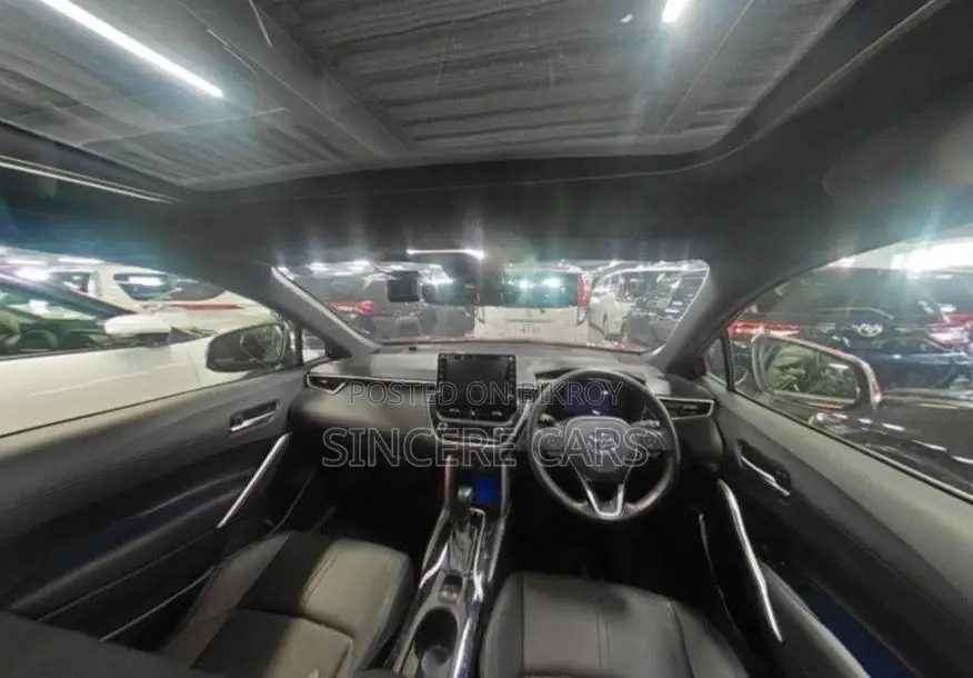 Toyota Corolla Cross Sunroof. Wine Red 2023