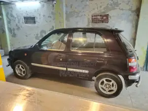 Nissan March 1996 Red
